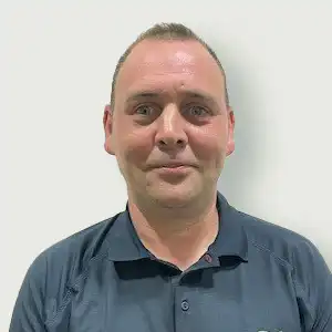 A member of staff, Phil Howard in a blue shirt